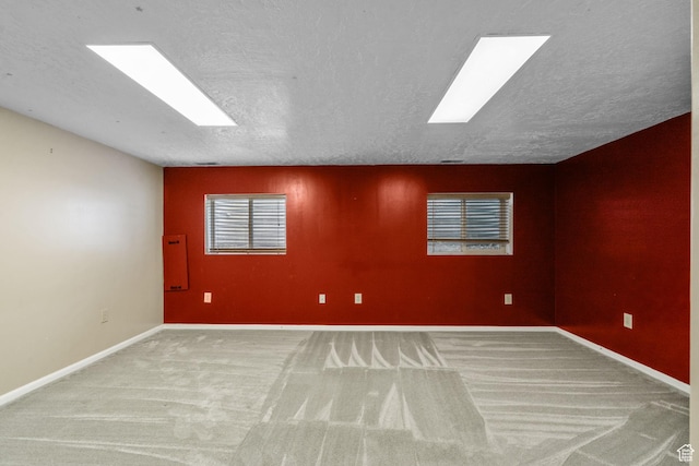 8711 S Rustler Rd, Cottonwood Heights, UT 84093 - carpeted empty room featuring a textured ceiling and baseboards