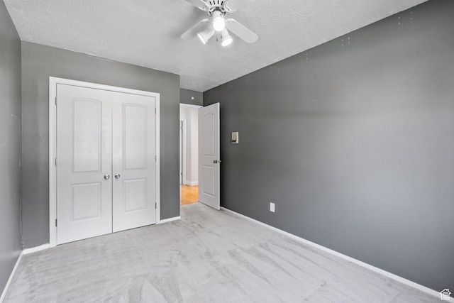 8711 S Rustler Rd, Cottonwood Heights, UT 84093 - unfurnished bedroom with a closet, a textured ceiling, carpet flooring, and ceiling fan