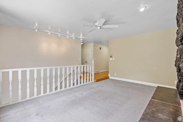 8711 S Rustler Rd, Cottonwood Heights, UT 84093 - carpeted empty room with a ceiling fan and rail lighting
