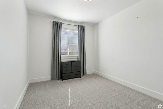 910 W 800 N, Tremonton, UT 84337 - empty room with light carpet and baseboards