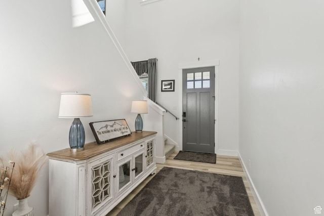 910 W 800 N, Tremonton, UT 84337 - entrance foyer featuring stairway, light wood finished floors, and a high ceiling
