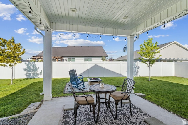 910 W 800 N, Tremonton, UT 84337 - fenced backyard featuring a patio area and a fire pit