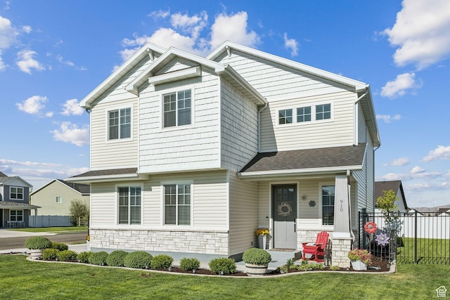 910 W 800 N, Tremonton, UT 84337 - craftsman-style home with stone siding, covered porch, and a shingled roof