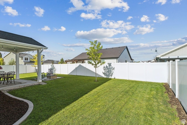 910 W 800 N, Tremonton, UT 84337 - fenced backyard with a patio area