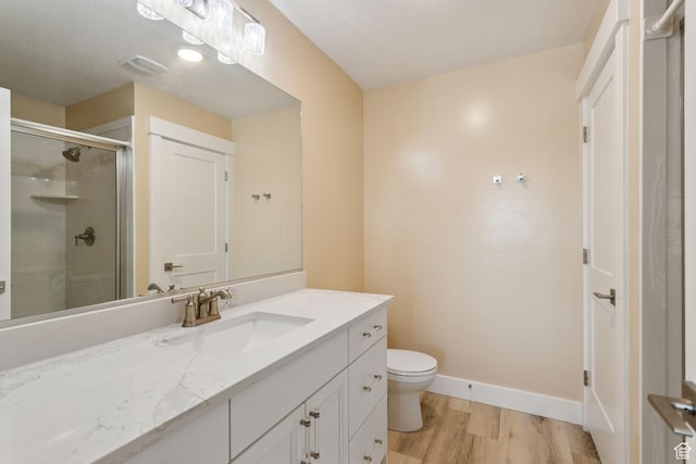 910 W 800 N, Tremonton, UT 84337 - full bathroom featuring vanity, wood finished floors, and a stall shower