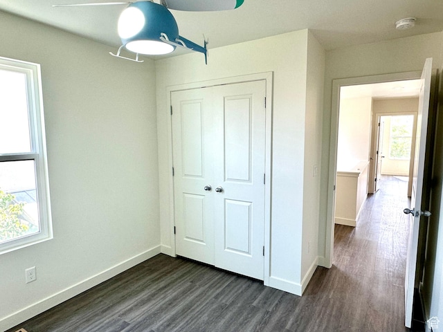 4843 W S Jordan Pkwy S, South Jordan, UT 84009 - unfurnished bedroom featuring dark wood-style floors and a closet