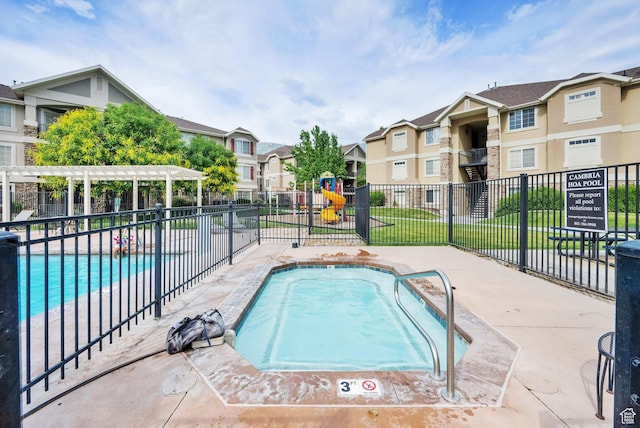1225 W Dallin Dr Unit Q102, Pleasant Grove, UT 84062 - community pool featuring a residential view and a pergola