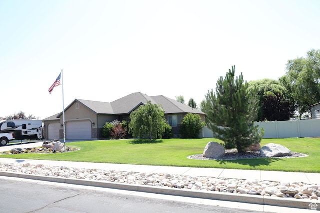 2681 N 3375 W, Plain City, UT 84404 - view of front of home with a garage and concrete driveway