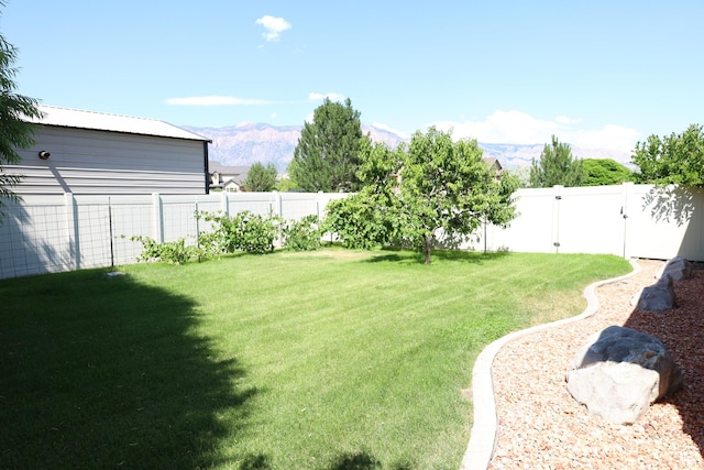 2681 N 3375 W, Plain City, UT 84404 - fenced backyard featuring a mountain view