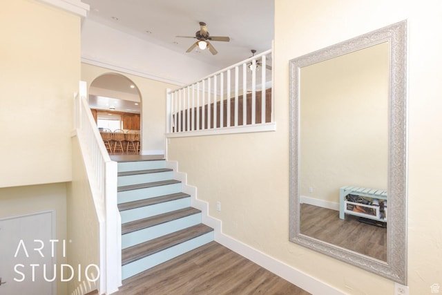 785 N Homestead St, Hildale, UT 84784 - stairway with a ceiling fan, wood finished floors, and arched walkways