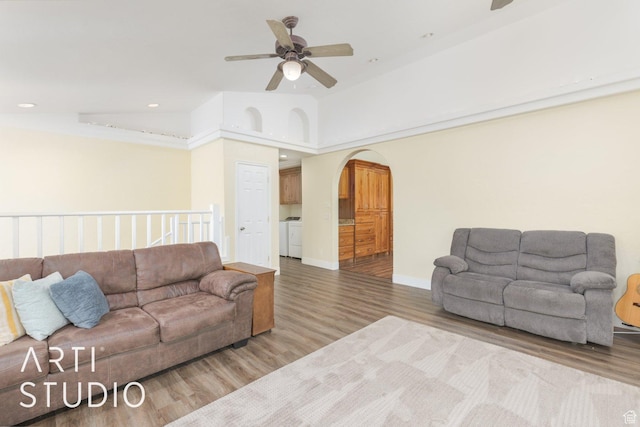 785 N Homestead St, Hildale, UT 84784 - living room featuring a ceiling fan, wood finished floors, arched walkways, and recessed lighting