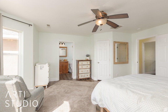 785 N Homestead St, Hildale, UT 84784 - bedroom with wood finished floors, ceiling fan, and ensuite bathroom