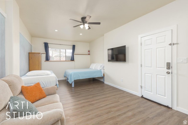 785 N Homestead St, Hildale, UT 84784 - bedroom with light wood-type flooring, a ceiling fan, and recessed lighting