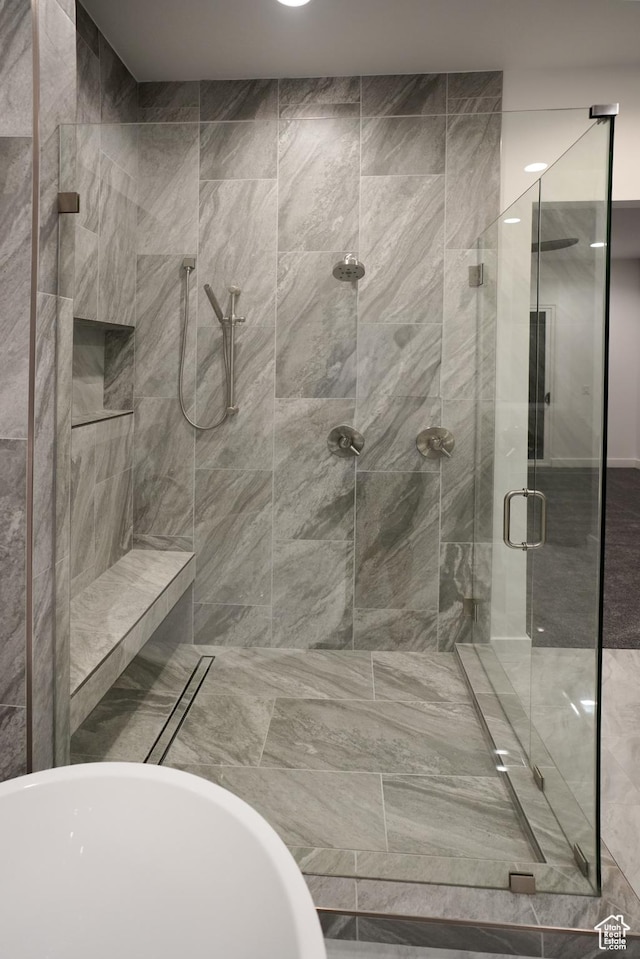9281 E Rdg Pine Dr, Heber City, UT 84032 - bathroom featuring a stall shower and a freestanding bath