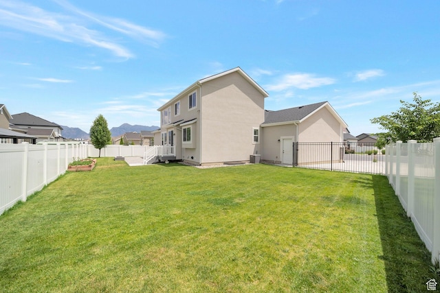3552 W 2950 N, Lehi, UT 84043 - rear view of house with a fenced backyard and stucco siding