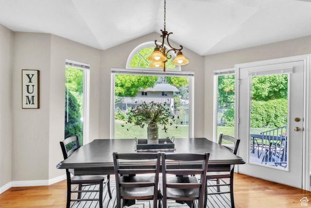 1630 N Camelot Dr E, North Logan, UT 84341 - dining space with light wood-style floors and lofted ceiling