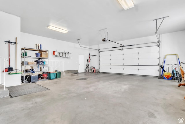 1630 N Camelot Dr E, North Logan, UT 84341 - garage with a garage door opener