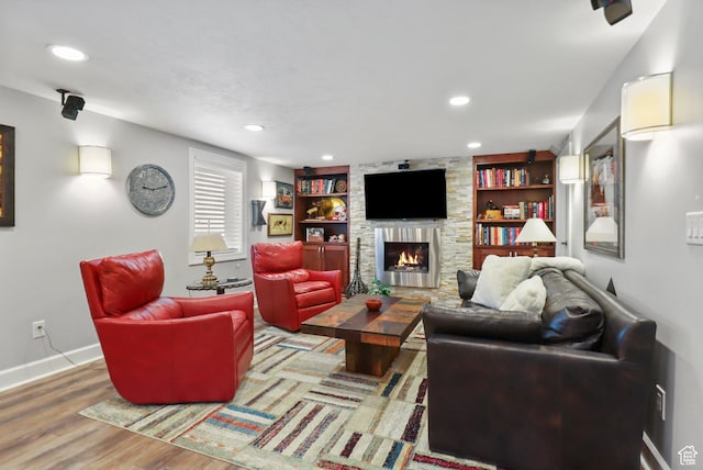 61 E 1700 S, Bountiful, UT 84010 - living area with a fireplace, wood finished floors, and recessed lighting