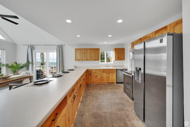 1719 Clyde Lake Dr Unit 346, Heber City, UT 84032 - kitchen with stainless steel appliances, recessed lighting, light countertops, and a ceiling fan