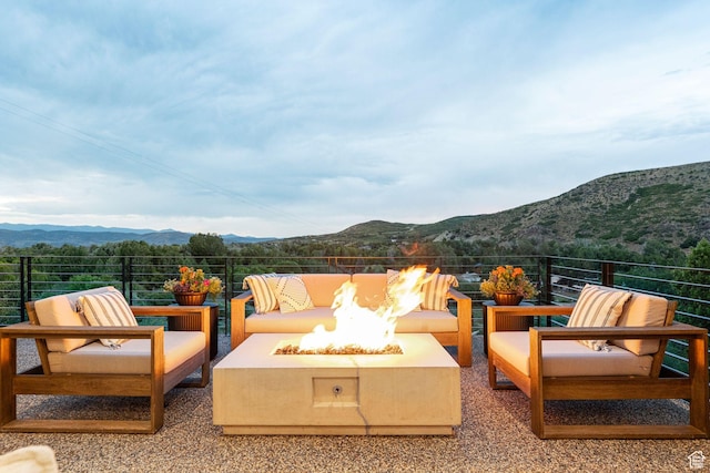 1400 Weber Wild Rd, Oakley, UT 84055 - view of patio / terrace with an outdoor fire pit and a mountain view