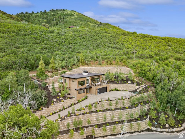 1400 Weber Wild Rd, Oakley, UT 84055 - aerial view of property and surrounding area featuring a heavily wooded area and a mountain backdrop