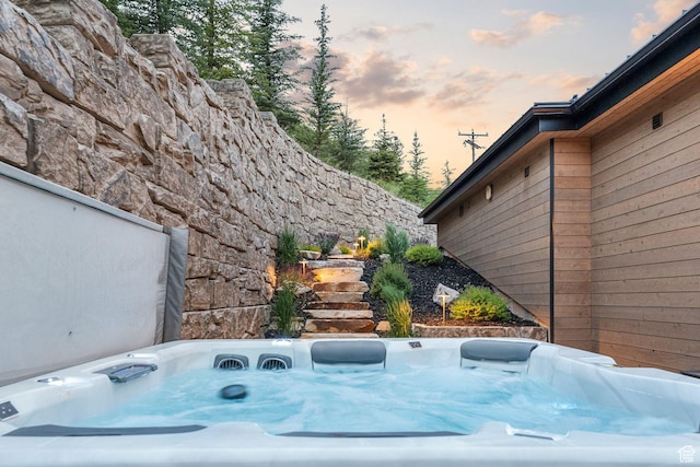 1400 Weber Wild Rd, Oakley, UT 84055 - exterior view of a hot tub and stone siding