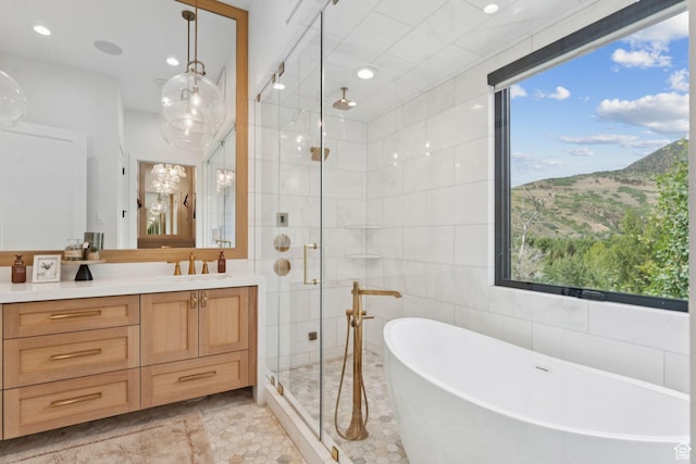 1400 Weber Wild Rd, Oakley, UT 84055 - full bath with a shower stall, vanity, a soaking tub, tile walls, and tile patterned flooring