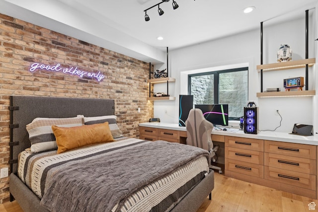 1400 Weber Wild Rd, Oakley, UT 84055 - bedroom with light wood finished floors, brick wall, an office area, and recessed lighting