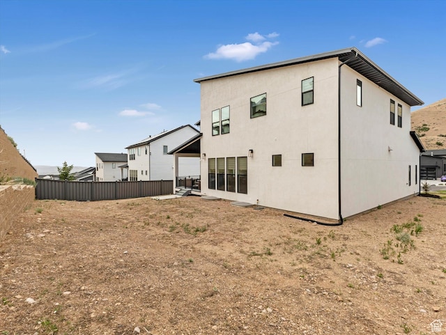 5796 N Valley View Rd, Lehi, UT 84043 - rear view of property with stucco siding