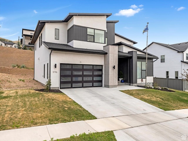 5796 N Valley View Rd, Lehi, UT 84043 - modern home with a garage, concrete driveway, and stucco siding