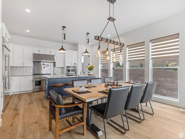5796 N Valley View Rd, Lehi, UT 84043 - dining space with light wood-style flooring and recessed lighting