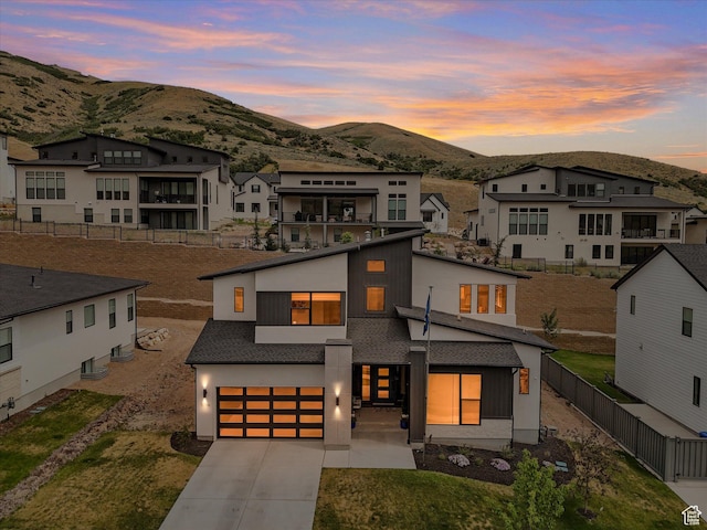 5796 N Valley View Rd, Lehi, UT 84043 - view of front of house featuring a mountain view, an attached garage, driveway, and a residential view