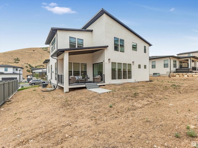 5796 N Valley View Rd, Lehi, UT 84043 - back of property with stucco siding and a mountain view