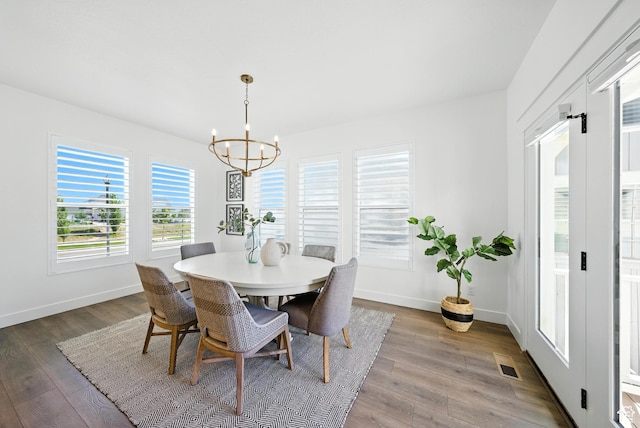 6331 W Copper Hawk Dr, South Jordan, UT 84009 - dining area with a chandelier and wood finished floors