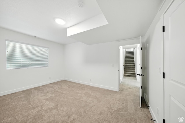 6331 W Copper Hawk Dr, South Jordan, UT 84009 - spare room featuring light colored carpet, a smoke detector, and stairs