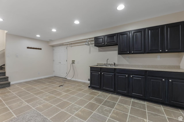 3152 W Davencourt Loop, Lehi, UT 84043 - kitchen with dark cabinetry, light countertops, recessed lighting, and light tile patterned flooring