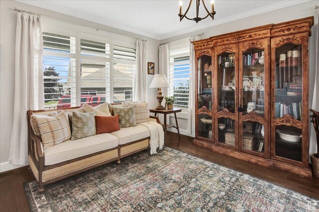955 Mink Cir N, Salt Lake, UT 84054 - sitting room featuring wood finished floors, a chandelier, and ornamental molding