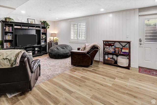 955 Mink Cir N, Salt Lake, UT 84054 - living room with wood finished floors, healthy amount of natural light, and a textured ceiling