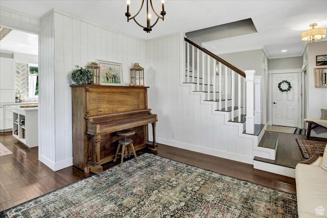 955 Mink Cir N, Salt Lake, UT 84054 - foyer with dark wood-type flooring, a chandelier, crown molding, and stairway