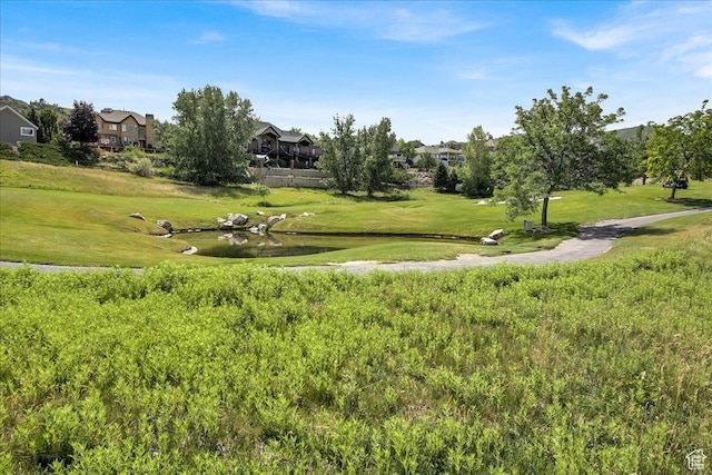 955 Mink Cir N, Salt Lake, UT 84054 - view of community with a lawn and a residential view