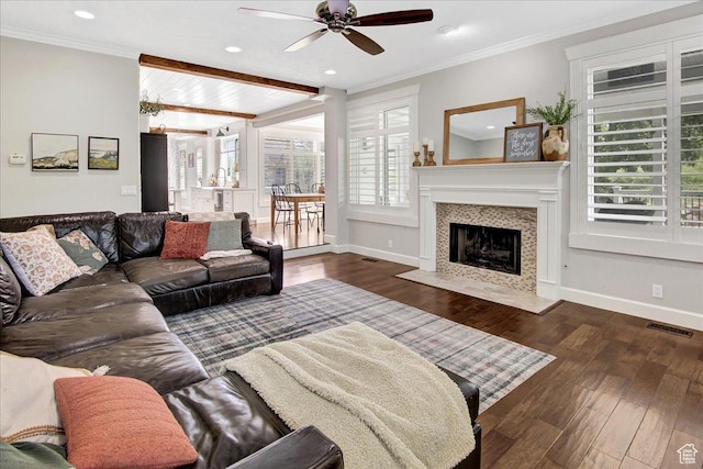 955 Mink Cir N, Salt Lake, UT 84054 - living room featuring a ceiling fan, wood finished floors, recessed lighting, a tiled fireplace, and crown molding