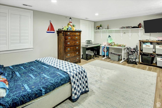 955 Mink Cir N, Salt Lake, UT 84054 - bedroom with light wood finished floors and recessed lighting