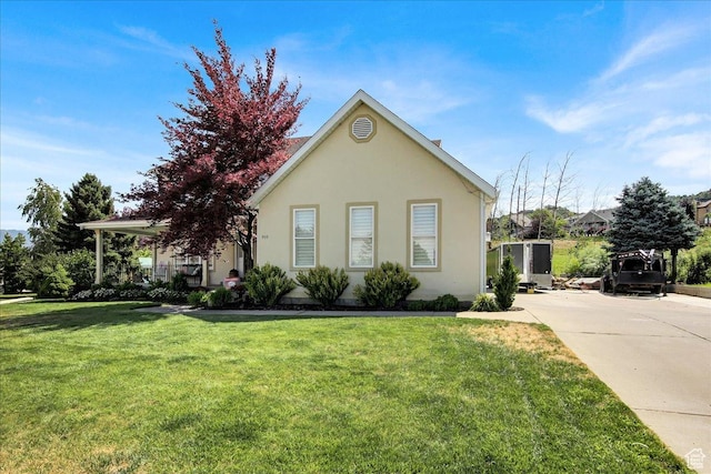 955 Mink Cir N, Salt Lake, UT 84054 - view of front facade with a front lawn and stucco siding