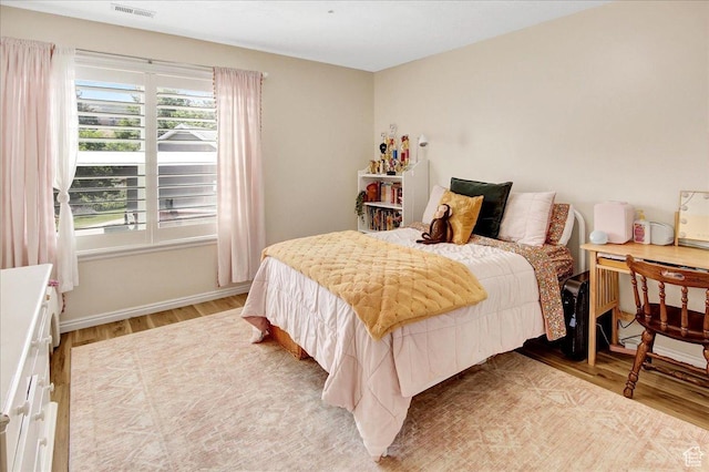 955 Mink Cir N, Salt Lake, UT 84054 - bedroom featuring light wood-style flooring and baseboards