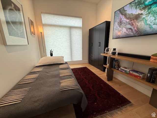 11515 N White Tail Ct, Hideout, UT 84036 - bedroom with light wood-style flooring