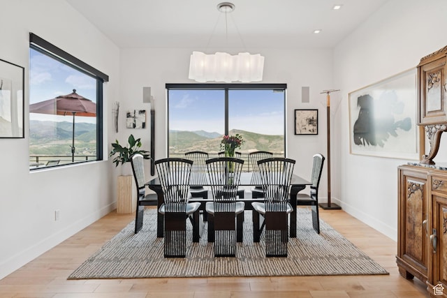 11515 N White Tail Ct, Hideout, UT 84036 - dining space with light wood-style floors, recessed lighting, and a chandelier