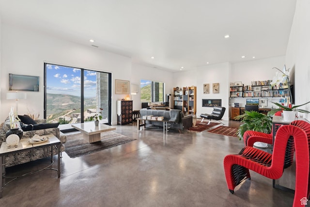 11515 N White Tail Ct, Hideout, UT 84036 - living room featuring concrete floors and recessed lighting