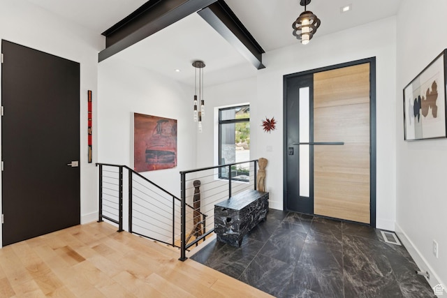 11515 N White Tail Ct, Hideout, UT 84036 - foyer entrance featuring beam ceiling and marble finish flooring