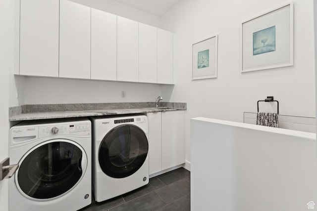 11515 N White Tail Ct, Hideout, UT 84036 - laundry room featuring washing machine and dryer, cabinet space, and dark tile patterned flooring