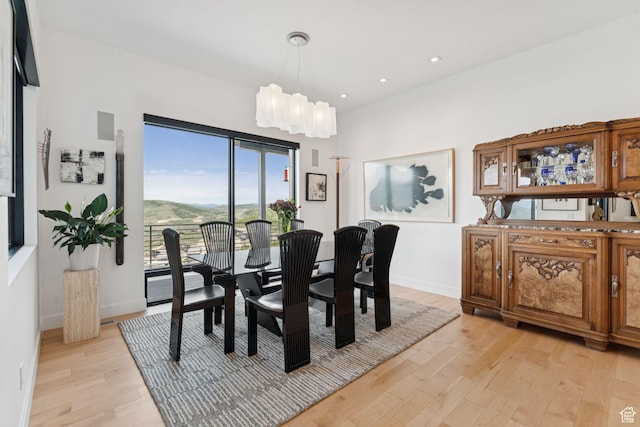 11515 N White Tail Ct, Hideout, UT 84036 - dining room featuring light wood-type flooring, recessed lighting, and a chandelier